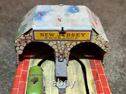 Vintage Unique Art's Mfg Co. Tin Litho Lincoln Tunnel Wind Up Toy, Works Perfect