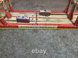Vintage Unique Art's Mfg Co. Tin Litho Lincoln Tunnel Wind Up Toy, Works Perfect