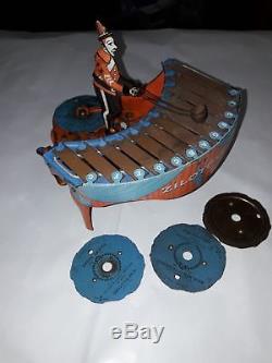 Vintage WOLVERINE ZILOTONE TIN TOY WIND-UP 1930s With Disc