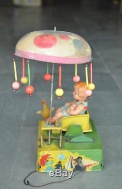 Vintage Wind Up ALPS Mark Litho Tin & Celluloid Girl With Duck & Ball Toy, Japan