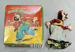 Vintage Wind Up Clown On Roller Skates In Original Box