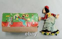 Vintage Wind Up Clown On Roller Skates In Original Box