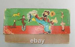 Vintage Wind Up Clown On Roller Skates In Original Box