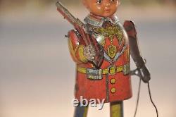 Vintage Wind Up FUKUDA Brand Litho Soldier With Gun Tin Toy, Japan