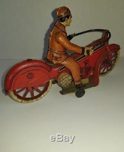 Vintage Wind Up German Motorcycle Toy Plus Rider SG Gunthermann