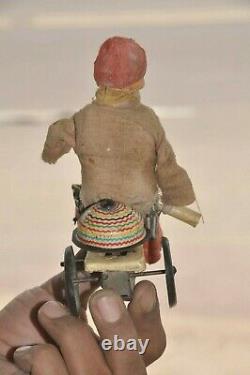 Vintage Wind Up Textured Cloth Boy Riding Tricycle Litho Tin Toy, Japan