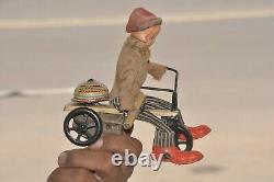 Vintage Wind Up Textured Cloth Boy Riding Tricycle Litho Tin Toy, Japan
