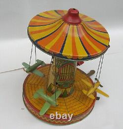 Vintage Wind Up Tin Litho Airplane Ride Toy Needs Some Work