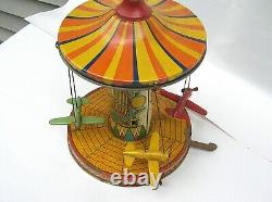 Vintage Wind Up Tin Litho Airplane Ride Toy Needs Some Work