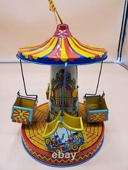 Vintage Wind Up Tin Litho Merry Go Round Toy