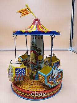 Vintage Wind Up Tin Litho Merry Go Round Toy