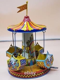 Vintage Wind Up Tin Litho Merry Go Round Toy