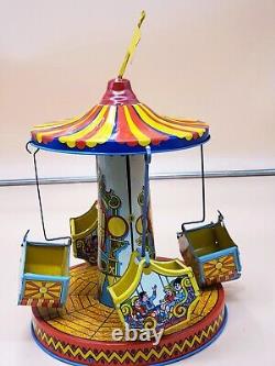 Vintage Wind Up Tin Litho Merry Go Round Toy