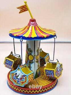 Vintage Wind Up Tin Litho Merry Go Round Toy