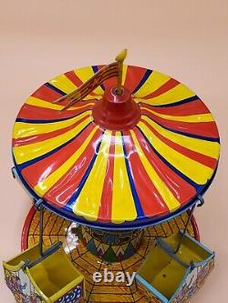 Vintage Wind Up Tin Litho Merry Go Round Toy