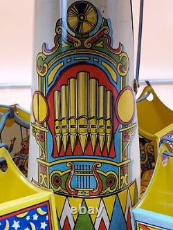 Vintage Wind Up Tin Litho Merry Go Round Toy