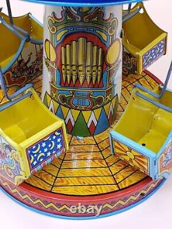 Vintage Wind Up Tin Litho Merry Go Round Toy