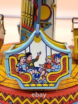 Vintage Wind Up Tin Litho Merry Go Round Toy