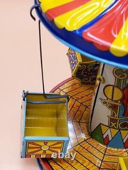 Vintage Wind Up Tin Litho Merry Go Round Toy