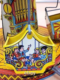 Vintage Wind Up Tin Litho Merry Go Round Toy