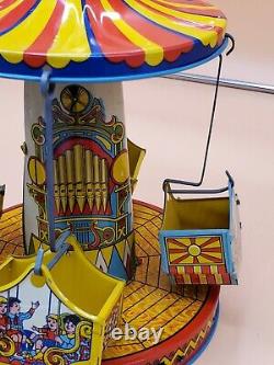 Vintage Wind Up Tin Litho Merry Go Round Toy