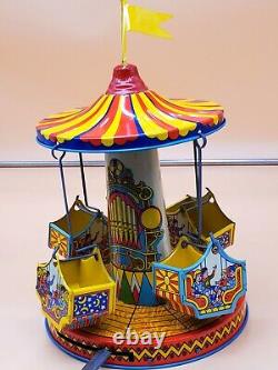 Vintage Wind Up Tin Litho Merry Go Round Toy