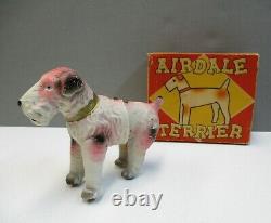 Vintage Wind-up Celluloid AIREDALE TERRIER Dog with Box Fox Terrier