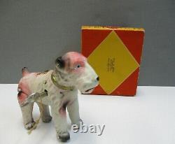 Vintage Wind-up Celluloid AIREDALE TERRIER Dog with Box Fox Terrier