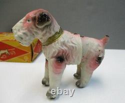 Vintage Wind-up Celluloid AIREDALE TERRIER Dog with Box Fox Terrier