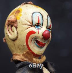 Vintage Wind up Childs Toy Clown with Amazing Patina and Decorative Style