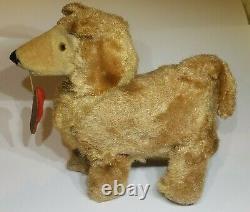 Vintage Wind-up Dog With Slipper in Mouth