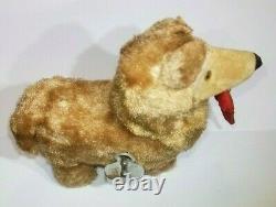 Vintage Wind-up Dog With Slipper in Mouth