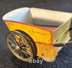 Vintage Windup Tin Litho Lehmann Tap Tap Man Pushing Cart or Porter Toy 1930s