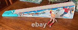 Vintage Wolverine Ski Jumper, Tin Litho Spring-Activated Toy, with figure