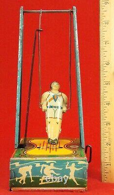 Vintage Wyandotte Man On The Flying Trapeze # 516 Wind Up Toy