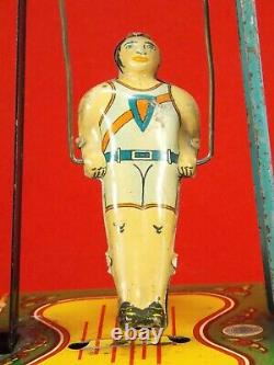 Vintage Wyandotte Man On The Flying Trapeze # 516 Wind Up Toy