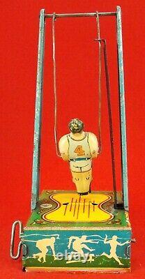 Vintage Wyandotte Man On The Flying Trapeze # 516 Wind Up Toy