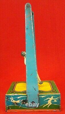 Vintage Wyandotte Man On The Flying Trapeze # 516 Wind Up Toy