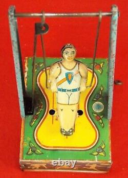 Vintage Wyandotte Man On The Flying Trapeze # 516 Wind Up Toy