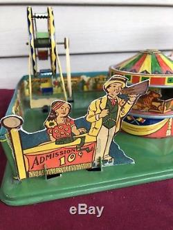 Vintage Wyandotte Wind Up Carnival Tin Toy Works