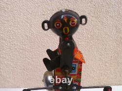 Vintage Yone Japan Carousal Black figure carousal Wind Up Tin Toy