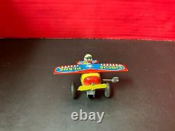 Vintage Yone wind up mechanical toy circus plane