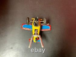 Vintage Yone wind up mechanical toy circus plane