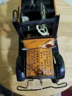 Vintage antique tin wind up Amos & Andy Open Air Taxi