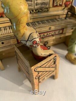Vintage antique tin wind up Lil Abner's Dog Patch Band, It works, Jigger toy