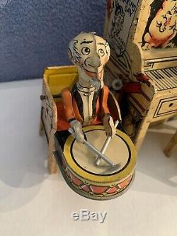 Vintage antique tin wind up Lil Abner's Dog Patch Band, It works, Jigger toy