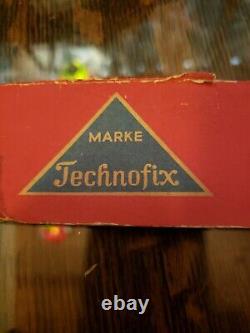 Vintage technofix German tin toy toboggan set from 1950s Very rare