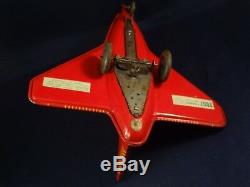 Vintage tin toy aircraft aeroplane wind-up supersonic pilot ejected Joustra 1952