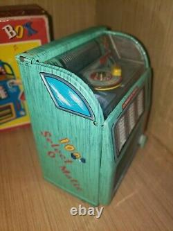 Vintage tin toy wind up Juke Box Haji Japan in original box working great clean