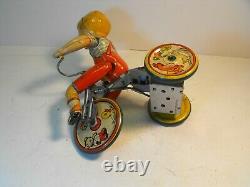 Vintage tin wind-up UNIQUE ART Mfg Co. Kiddy Cyclist, complete & works